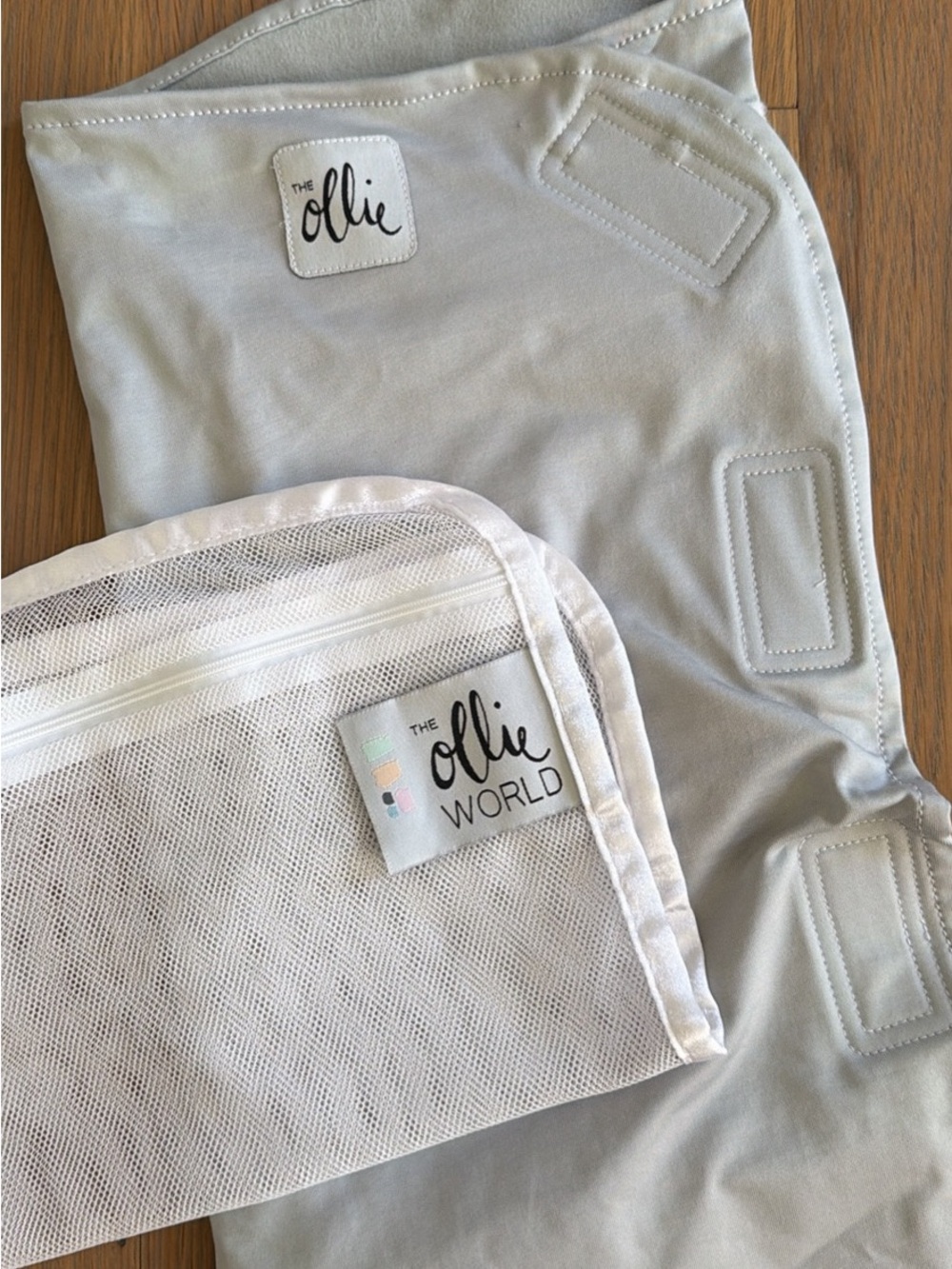 Ollie swaddle with mesh laundry bag